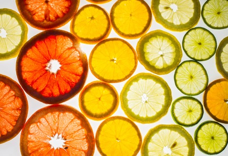 Background of some various colorful citrus slices.
