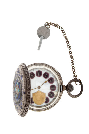 Vintage pocket watch on a white background.
