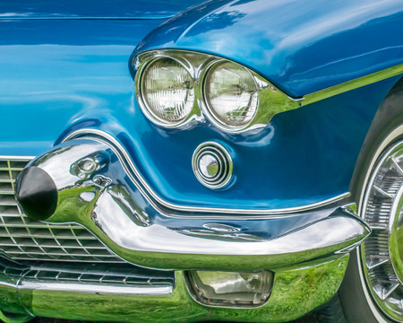 GROSSE POINTE SHORES, MIUSA - JUNE 21, 2015: A 1958 Cadillac Eldorado headlight reflection at the EyesOn Design car show, held at the Edsel and Eleanor Ford House.のeditorial素材