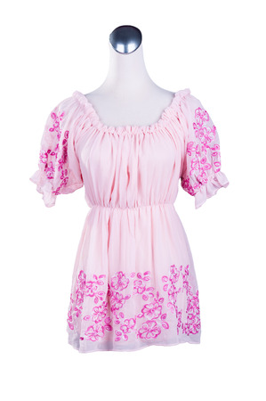 Womens beautiful dress on mannequin on white backgroundの写真素材