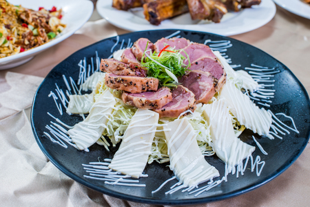 Salad breast smoked duck with abalone slicesの写真素材