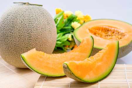 cantaloupe melon on the wooden tableの写真素材