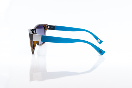 purple sunglasses on white backgroundの写真素材