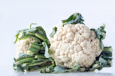 Fresh cauliflower on white backgroundの写真素材