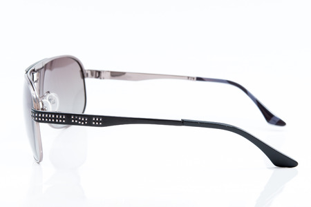 purple sunglasses on white backgroundの写真素材