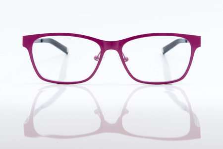 pink glasses isolated on white backgroundの写真素材