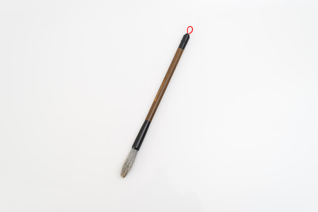 Chinese traditional calligraphy utensil. Writing brushes isolated on white backgroundの写真素材