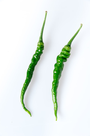 green hot pepper on a white backgroundの写真素材