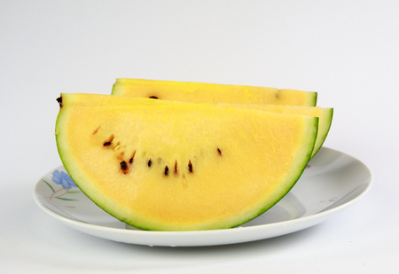 slice of watermelon isolated on white backgroundの写真素材