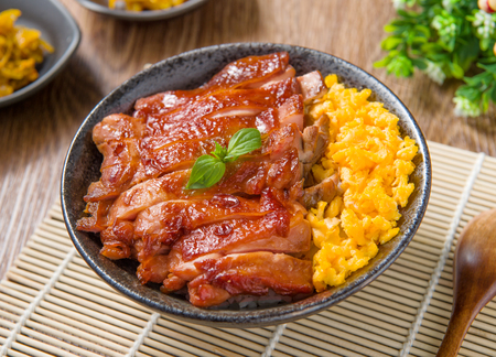 chicken rice (chinese food) on bamboo slipsの写真素材