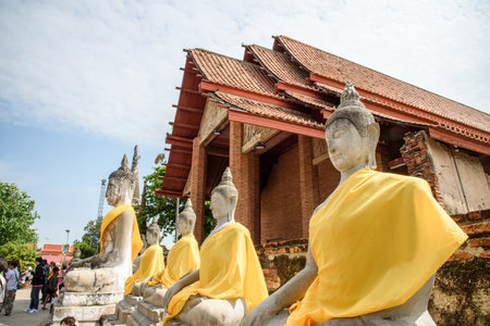 Phra Nakhon Si Ayutthaya, Thailand - April 08, 2018: Buddha statues in Phra Nakhon Si Ayutthaya, at yai chaimongkol Thailand, one of the famous historical landmark in the center of Thailand.のeditorial素材