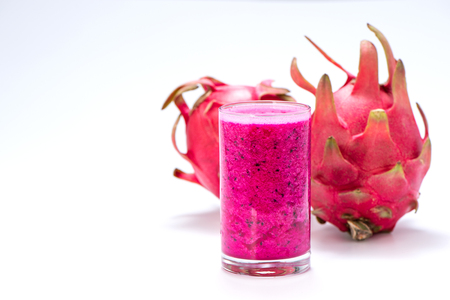 Fresh red dragon (pitaya) fruit juice in glass mug.の写真素材