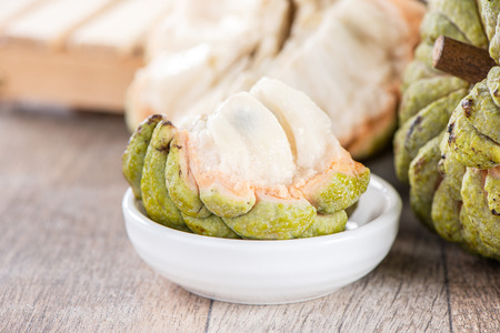 fresh sugar apple fruit(Custard Apple),sweetsop on wooden table background