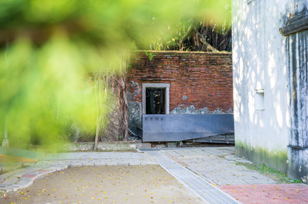 Tainan Anping, Taiwan - September 20, 2018: Anping Tree House at Anping District, Taiwan on September 20, 2018. This old warehouse is covered by branched of ancient Banyan Tree which is respected as sacred tree.のeditorial素材