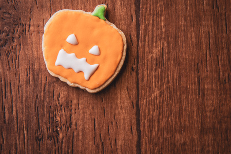 Fresh delicious homemade decorated halloween cookies sweets on dark wooden background, concept of halloween party, copy space(text space), top view, blank for text.の写真素材