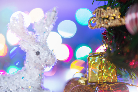 Christmas tree with beautiful xmas decoration in blurry sparkle background, bokeh, close up, copy space (text space)の写真素材