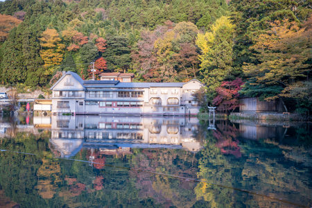 Yufuin Kinrinko, Japan, November 07, 2018: Beautiful red maple leaves at lake kinrinko, oita, Japan.のeditorial素材