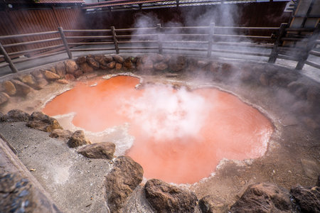 Kamado Jigoku (Cooker Hell) pond in autumn, which is one of the famous natural hot springs viewpoint, representing the various hells in Beppuのeditorial素材