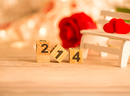 Concept of Valentine, anniversary, wedding celebration and propose, heart shapes on a white wooden...