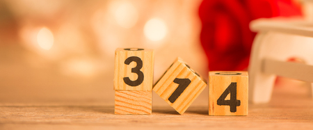 Concept of Valentine, anniversary, wedding celebration and propose, heart shapes on a white wooden bench, bokeh background, closeupの写真素材