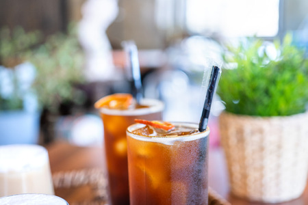 Coffee time with friends, cups of drink in coffeehouse, party concept, happy hangout together in cafe, lifestyle, copy space, top view, close upの写真素材