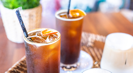 Coffee time with friends, cups of drink in coffeehouse, party concept, happy hangout together in cafe, lifestyle, copy space, top view, close upの写真素材