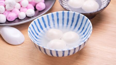 Tang yuan, tangyuan, yuanxiao in a small bowl. Delicious asian traditional festive food rice...