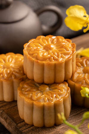 Mooncake, Moon cake for Mid-Autumn Festival, concept of traditional festive food on black slate...