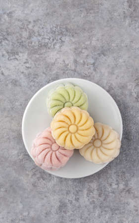 Colorful snow skin moon cake, sweet snowy mooncake, traditional savory dessert for Mid-Autumn...