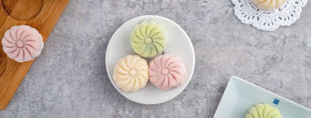 Colorful snow skin moon cake, sweet snowy mooncake, traditional savory dessert for Mid-Autumn...
