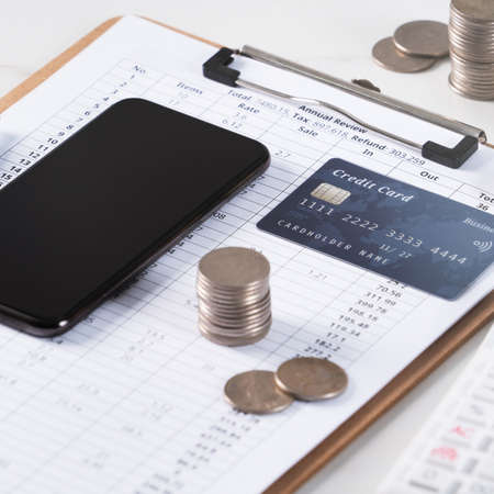 Design concept of annual summary analysis review report with calculator, paying with electronic...