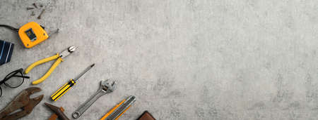 Top view design concept of Father's day and labor day with working tools on blue background.の写真素材