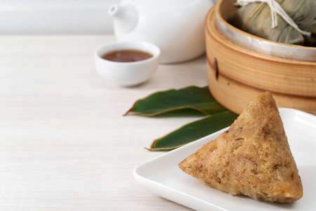 Zongzi. Rice dumpling for Chinese traditional Dragon Boat Festival (Duanwu Festival) on bright...