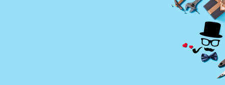 Father's day background design concept. Top view of color paper decoration layout ideas and working...