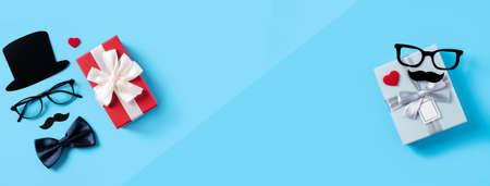 Father's day background design concept. Top view of color paper decoration layout ideas with gift...