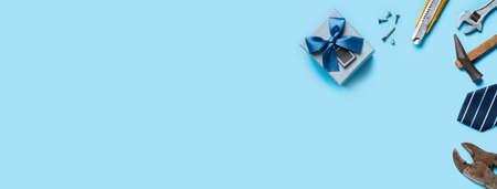 Top view design concept of Father's day and labor day with working tools on blue background.