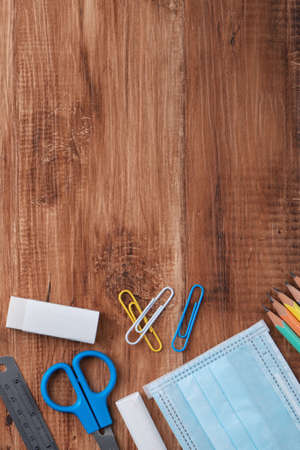 Back to school student design concept, top view of stationery over wooden table background with copy...