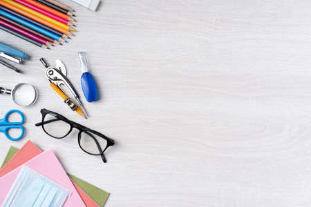Back to school student design concept, top view of stationery over wooden table background with copy space.の写真素材