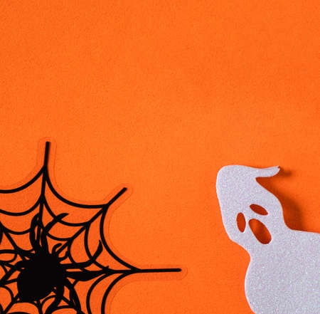 Top view of creative Halloween concept decoration on orange paper table background.の写真素材