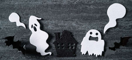 Top view of Halloween concept decoration on dark black slate background.の写真素材