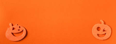 Top view of creative Halloween concept decoration on orange paper table background.の写真素材