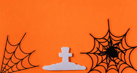 Top view of creative Halloween concept decoration on orange paper table background.の写真素材