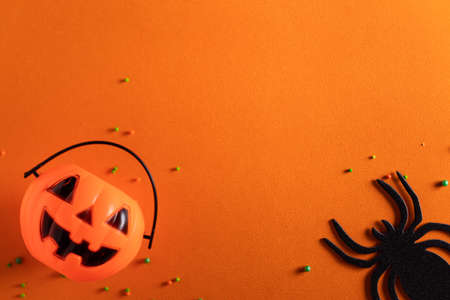 Top view of creative Halloween concept decoration on orange paper table background.の写真素材