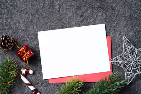 Top view of Christmas background design concept with fir tree branch, snowflake, pine cones and...