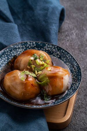 Close up of Bawan (Ba wan), Taiwanese meatball delicacy, delicious street food, steamed starch...