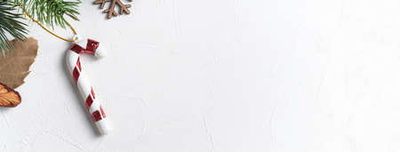 Top view of Christmas decorations background on white table background with copy space, concept of holiday celebration.の写真素材