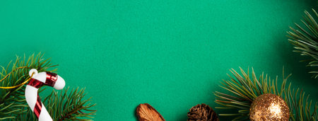 Top view of Christmas shopping design concept with gift box and shopping cart on green table...