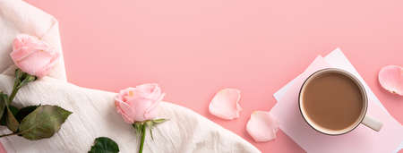 Valentine's Day design concept background with pink rose flower and milk tea on pink table background.の写真素材
