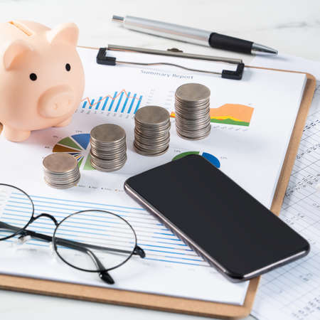 Design concept of annual summary analysis review report with calculator, saving, home finance...