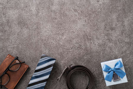 Father's day background design concept. Top view of paper decoration ideas with gift box on gray table background.の写真素材